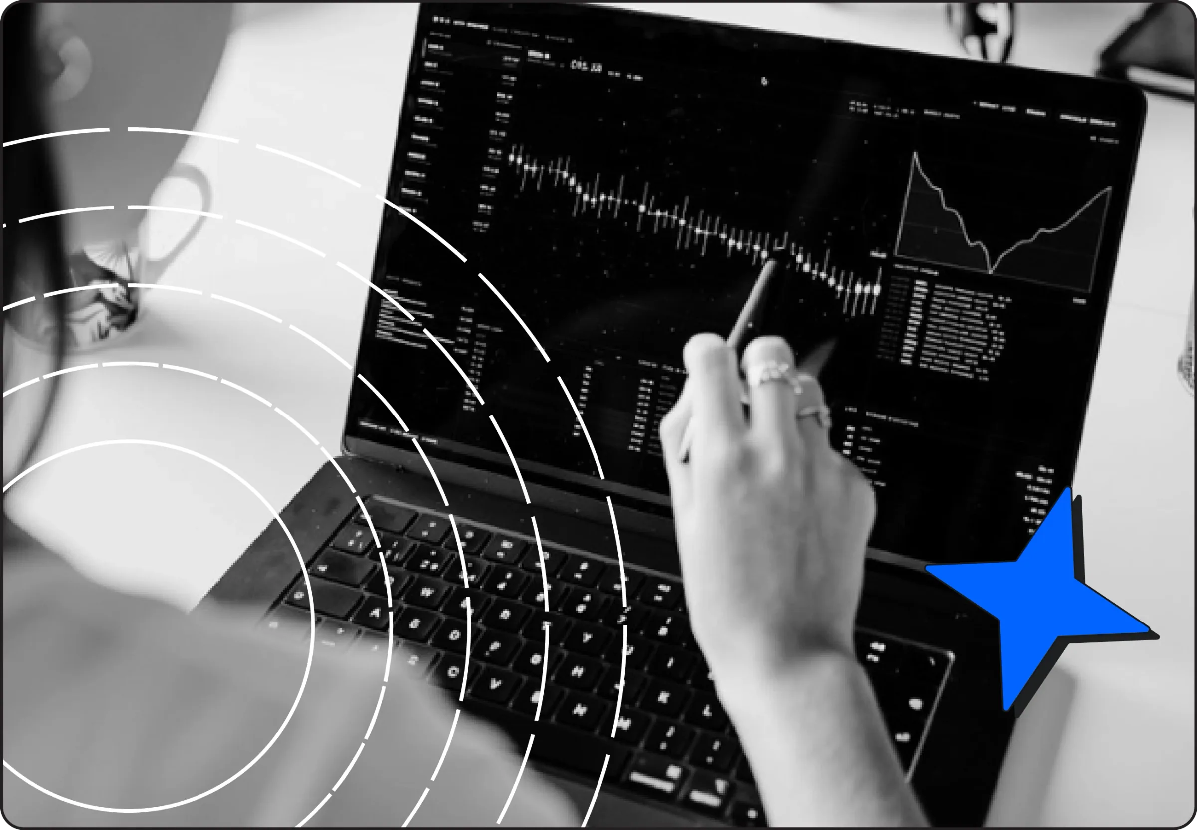 Analyst reviewing financial market data on a laptop